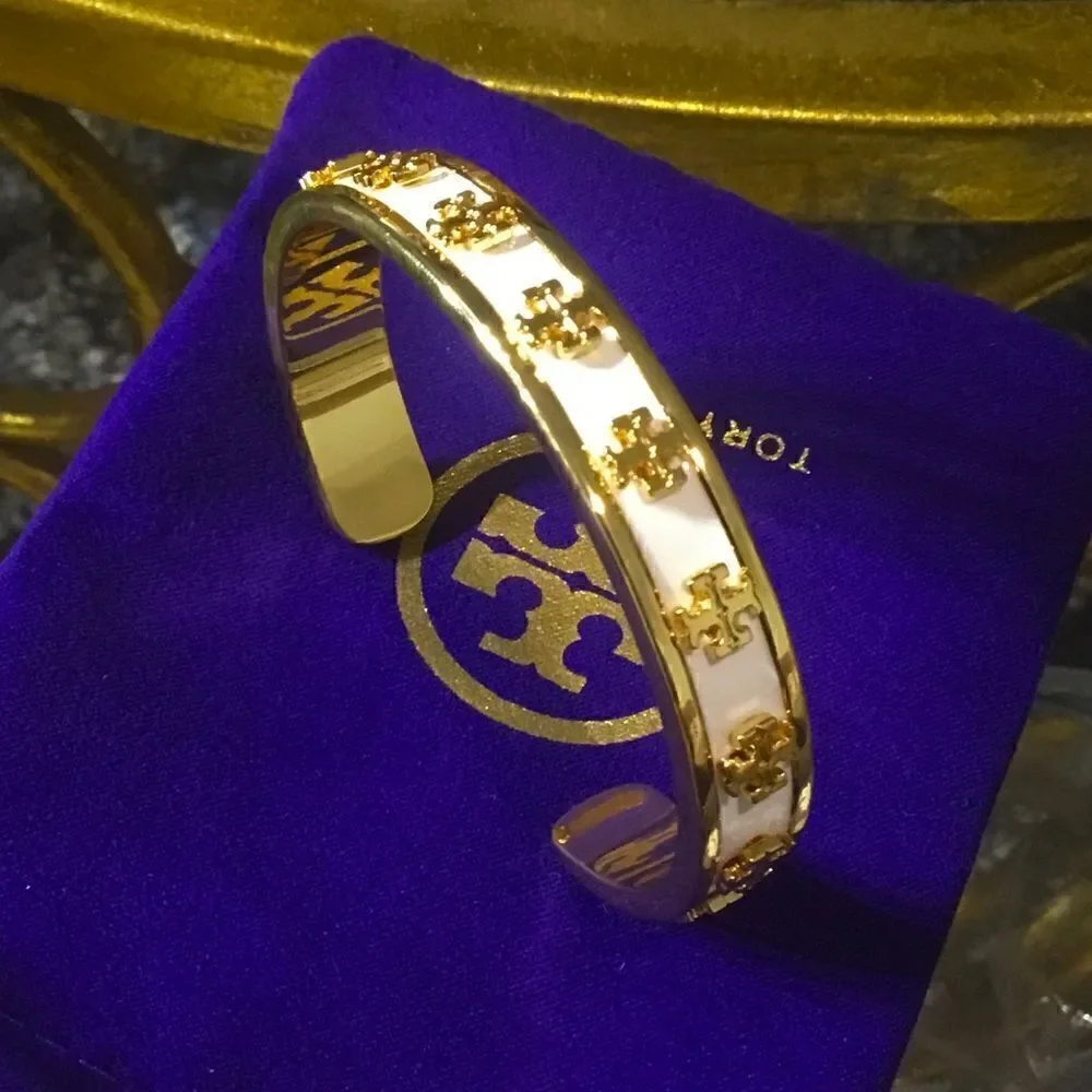TORY BURCH LACQUERED RAISED KIRA LOGO STUDDED BRACELET